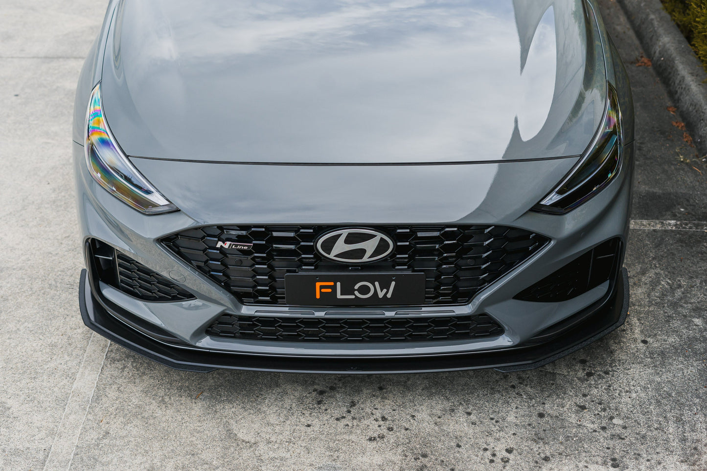 Flow Designs i30N-Line Hatch PDe.V6 FL 2024+ Front Lip Splitter Extensions (Pair)
