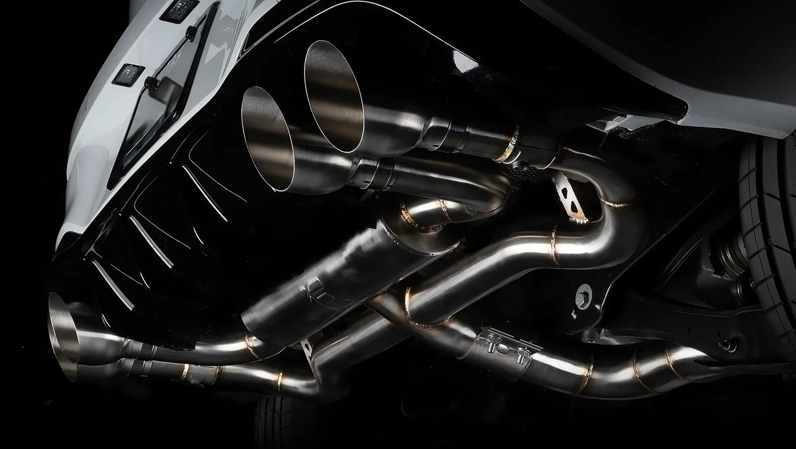 Integrated Engineering stainless exhaust fitted under a car
