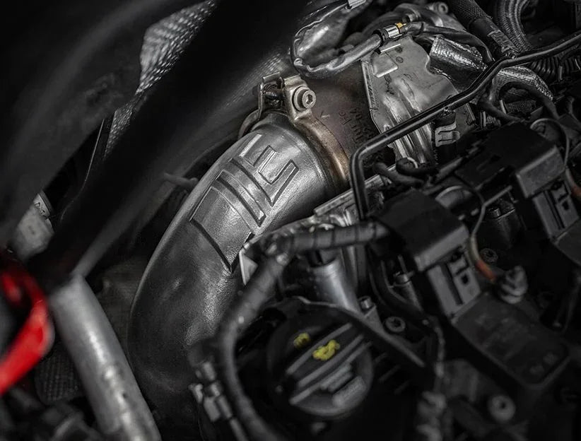 Integrated Engineering downpipe fitted in a VW engine bay